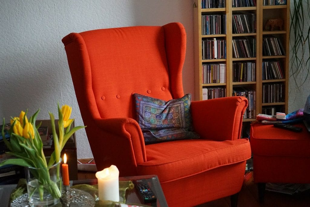 red chair in cozy room 