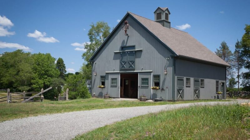 Converted barn garage in Massachusetts with grey-green exterior